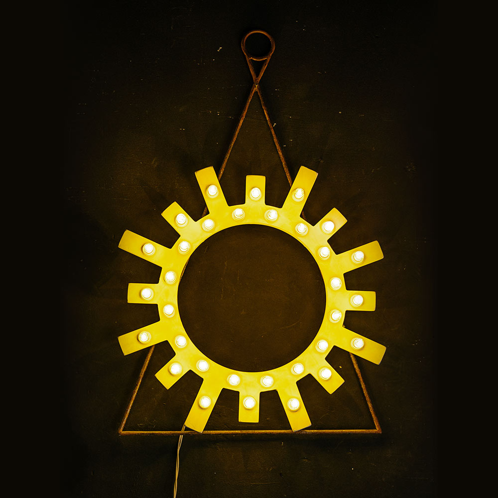 Lampada simbolo sole